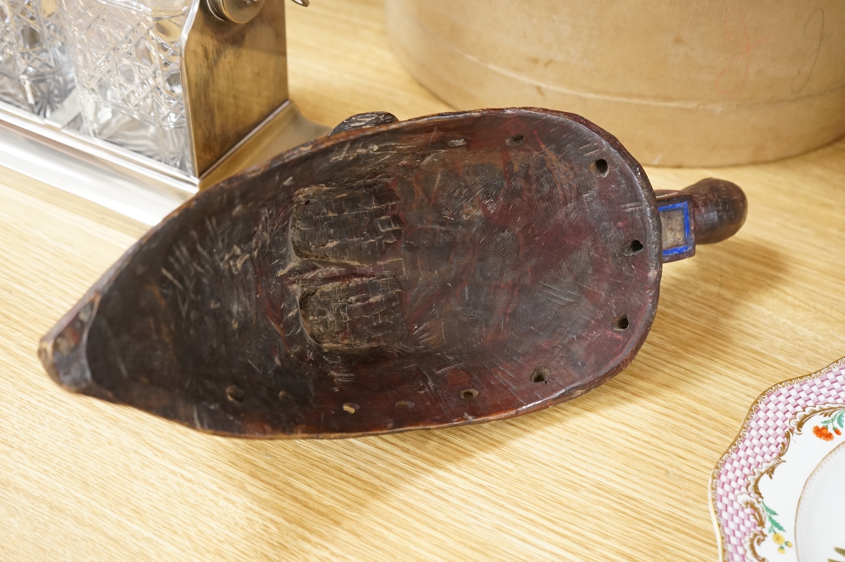 A carved African Ivory Coast mask, 39cm high